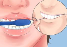 کشیدن نخ دندان موثر در سلامتی لثه و داندانها