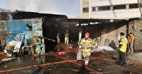 مصدومیت دو نفر و یک آتش‌نشان در آتش سوزی کارگاه شارژ سیلندر گاز مایع